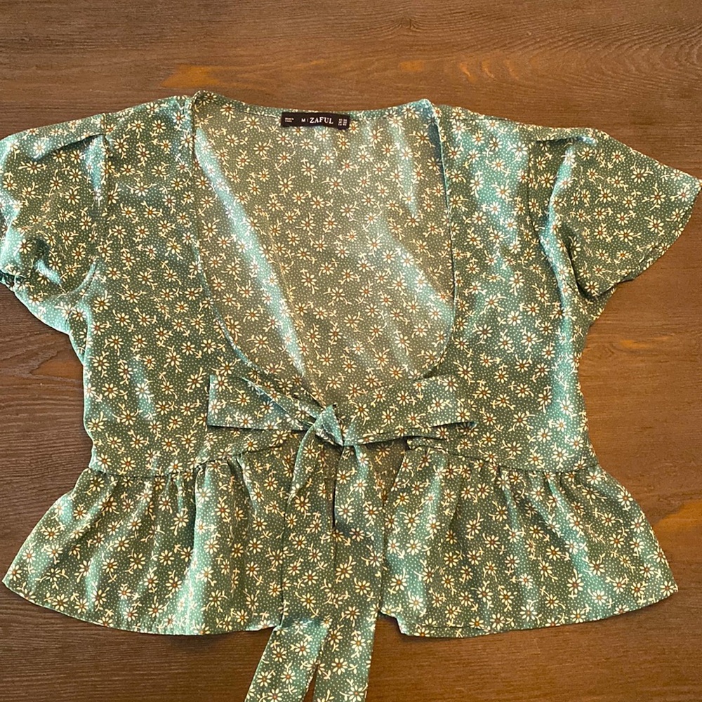 Cute floral butterfly sleeve peplum blouse!